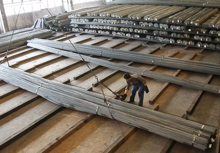 Steel is loaded by a worker of Thai Nguyen Iron and Steel Company.