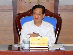 PM Nguyen Tan Dung addresses the meeting. Photo: VNA