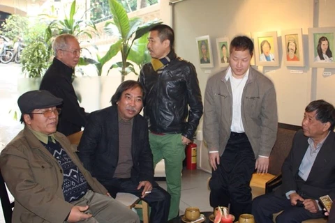 Writers at the opening ceremony of exhibition (Source: VNA)