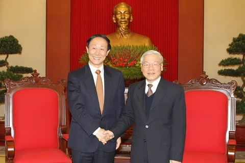 Party General Secretary Nguyen Phu Trong and Wang Jiarui, Vice Chairman of the National Committee of the Chinese People’s Political Consultative Conference and head of the Communist Party of China (CPC) Central Committee’s International Department (Source