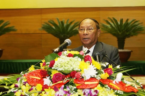 Chairman of the Cambodian National Assembly Heng Samrin speaks at the meeting. (Source: VNA)