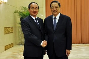 President of VFF Central Committee Nguyen Thien Nhan and Chairman of the CPPCC’s National Committee Yu Zhengsheng (Source: VNA)