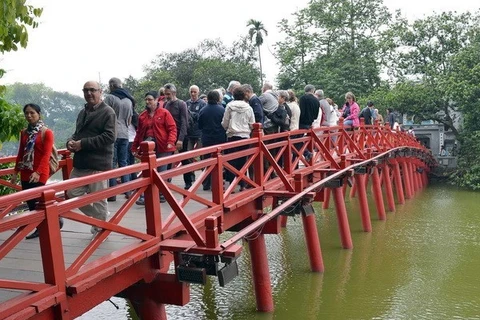Tourists visit Ngoc Son Temple (Source: VNA)