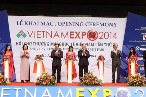 Deputy Prime Minister Hoang Trung Hai attends the opening ceremony of 2014 Vietnam Expo (Source: VNA)