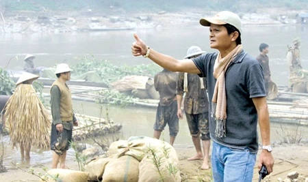 Director Nguyen Thanh Van on the set of Song Cung Lich Su (Living with History). The movie will be screened free of charge from April 26 to 30 at the National Cinema Centre. — File Photo