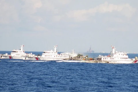 China sends a large number of ships to escort its Haiyang Shiyou-981 oil rig in Vietnam's waters. (Source: Vietnam Coast Guard) 