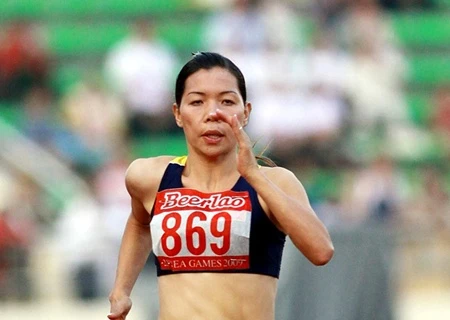 Vu Thi Huong of Viet Nam snatches a double title at the Track and Field International Championships which closed in HCM City on Saturday. Huong triumphed in the women's 100m and 200m events. — Photo tdtt.gov.vn