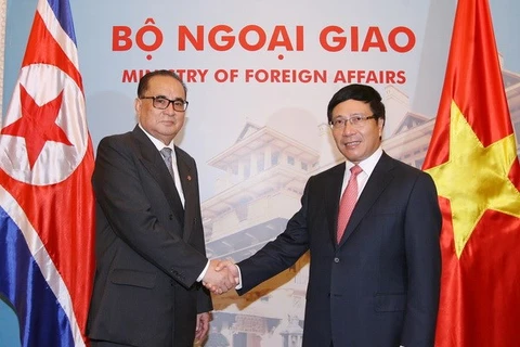 Deputy Prime Minister and Foreign Minister Pham Binh Minh welcomes DPRK Foreign Minister Ri Su-yong (Source: VNA)