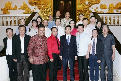 Deputy Prime Minister Vu Duc Dam and other delegates (Photo: VNA)