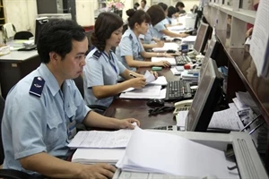 Ministry of Finance supports businesses in customs procedures (Illustrative image. Photo: VNA)