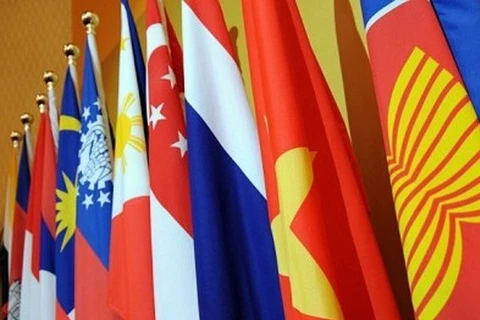 The flags of ASEAN (first, right) and member countries (Photo: AFP)