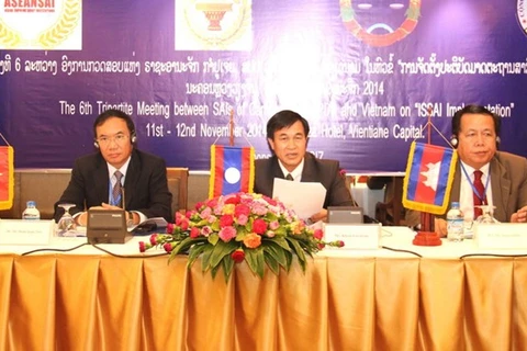 Presidium at the meeting. (Source: VNA)