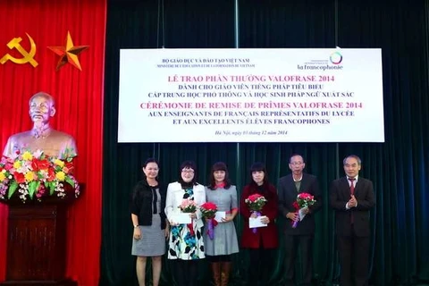 Ten teachers who have contributed to developing the French language at high schools in Vietnam received Valofrase awards. (Source: VNA)