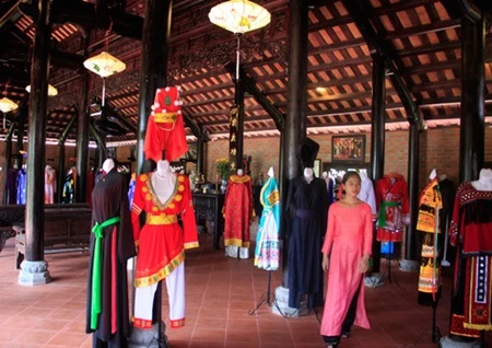 Silk products made by Duy Xuan Village artists on display (File Photo)