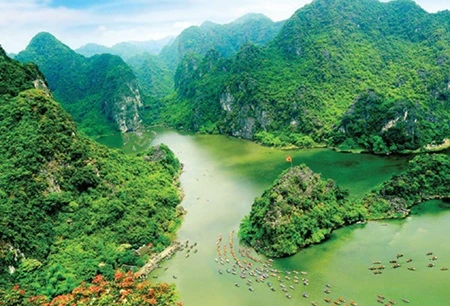 Trang An Scenic Landscape in Ninh Binh Province was named on UNESCO's World Heritage List in June 2014, the country's first site to be acknowledged as a mixed natural and cultural site (Photo: VNA)
