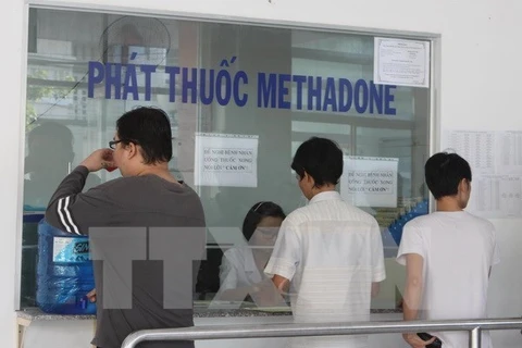 Patients are given methadone at a local treatment facility. (Photo: VNA)
