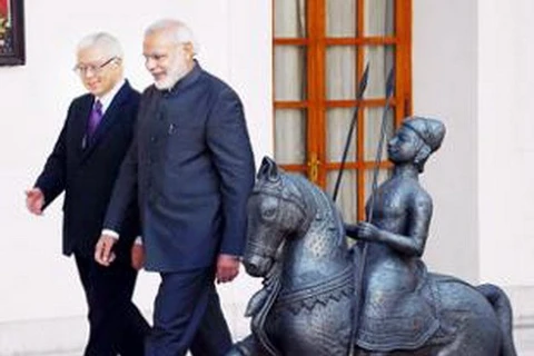 Singapore's President Tony Tan Keng Yam (L) and Indian Prime Minister Narendra Modi (Photo: economictimes.indiatimes.com)