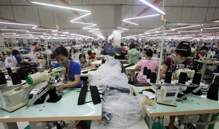 The country's key export products include garments and textiles, footwear and farm produce (Photo: VNA)