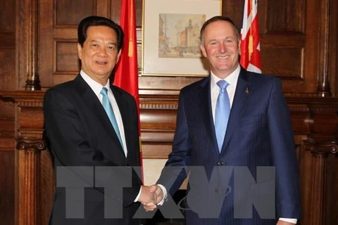 Vietnamese Prime Minister Nguyen Tan Dung (L) and his New Zealand counterpart John Key (Photo: VNA)
