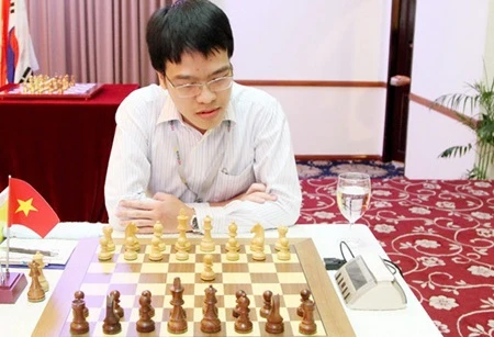 Le Quang Liem took the title at the HD Bank Cup International Open Chess tournament in HCM City yesterday.(Photo thanhnien.com.vn)