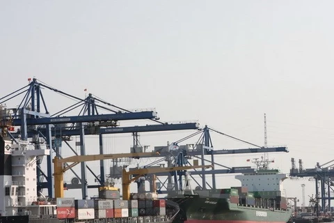 Containers are loaded at the Cat Lai port, HCM City (Photo: VNA)