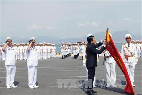 President Truong Tan Sang attends a ceremony to mark the 60th anniversary of the Vietnamese navy in the central province of Khanh Hoa (Photo: VNA)