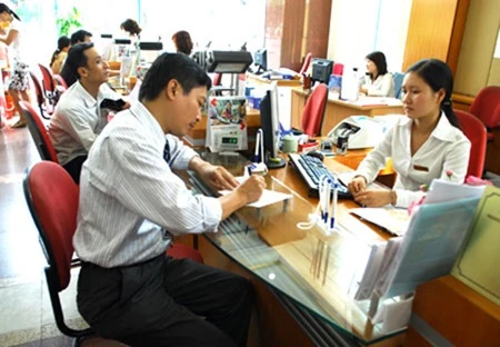 According to a report by the Vietnam Chamber of Commerce and Industry, SMEs accounted for more than 97 percent of Vietnam's businesses, but only 30 percent of them could access credit from banks (Photo: tccl)