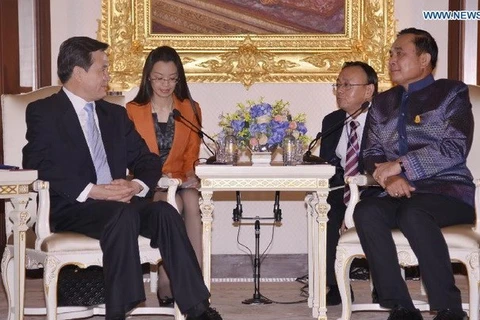 Thai Prime Minister Prayuth Chan-ocha (R) and Chinese State Councilor Yang Jing (Photo: news.xinhuanet.com)