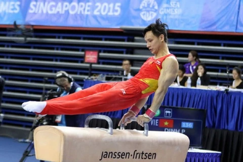 Gymnast Dinh Phuong Thanh wins a gold medal (Photo: VNA)