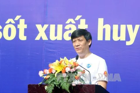 Deputy Minister of Health Nguyen Thanh Long speaks at the event (Photo: VNA)