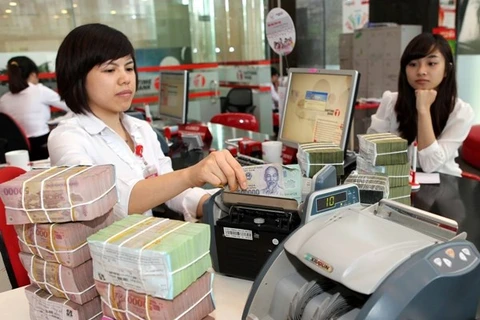 Moody's Investors Service last week assigned its new bank rating methodology of CR Assessments to nine Vietnamese banks (Photo: VNA)