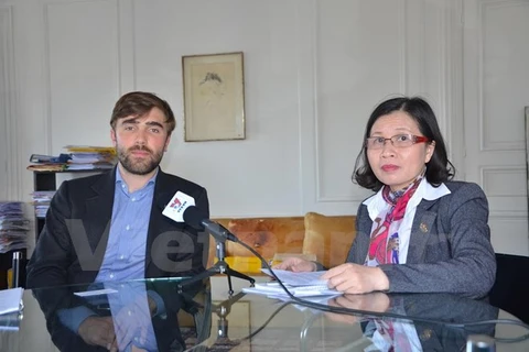 Lawyer Bertrand Repolt (L) during an interview granted to a VNA correspondent (Source: VNA)