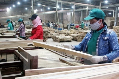 Wood processing for export (Source: VNA)