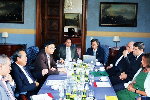 The talks between representatives of the Vietnam Supreme People’s Court and the Austrian Supreme Court of Justice (Photo: VNA)