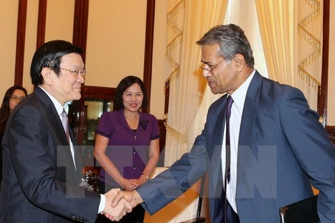 President Truong Tan Sang (left) and IMF Resident Representative for Vietnam and Laos Sanjay Kalra (right) (Source: VNA)