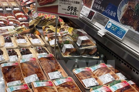 Pescado Tra entre productos de calidad superior en supermercados de Japón