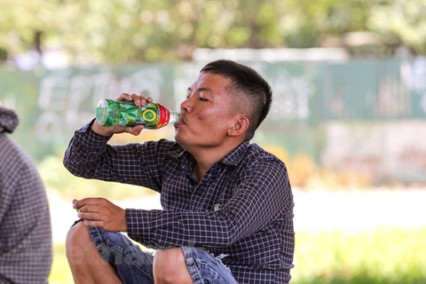 [Foto] Hanoienses buscan sobrevivir en "hornos" de 40 grados Celcius 