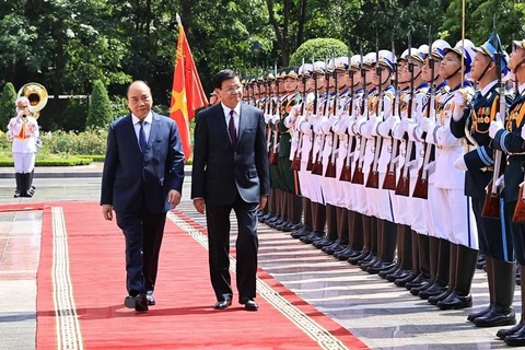 Visita de máximo dirigente de Laos a Vietnam, nuevo marcador de nexos bilaterales