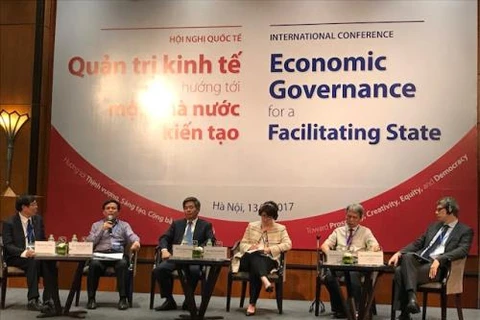Intercambian en Vietnam experiencias internacionales sobre gobernanza económica 
