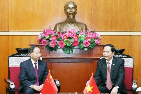 Organizaciones de masas de Vietnam y China intensifican nexos de cooperación 