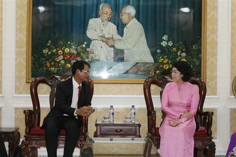 Impulsan cooperación entre organizaciones de masas de localidades de Vietnam y Laos