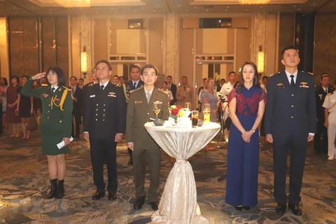 Celebran en Singapur LXXV Aniversario de fundación del Ejército de Vietnam