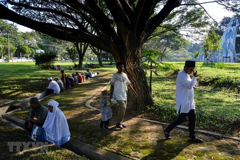 Rememoran a víctimas de doble desastre natural en Indonesia en 2014 