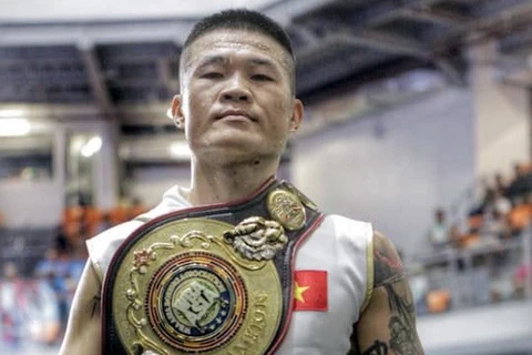 Conquista boxeador vietnamita cinturón de peso supermediano en campeonato asiático 