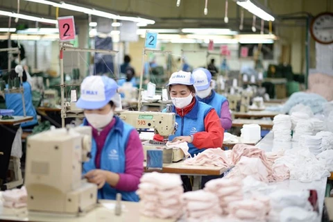 Grupo vietnamita suministra al mercado 38 millones mascaras sanitarias de tela