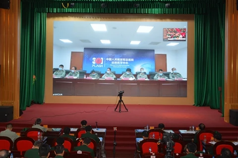 Medicina militar de Vietnam y China comparten experiencias en control del COVID-19