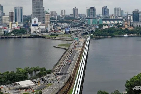 Debaten Malasia y Singapur reapertura de puertas fronterizas