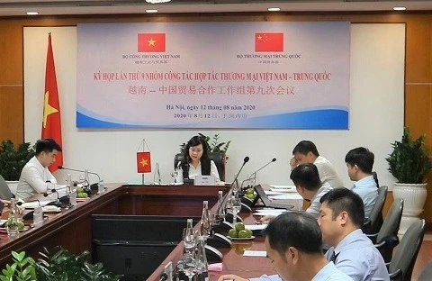 Debaten medidas para impulsar cooperación comercial Vietnam-China