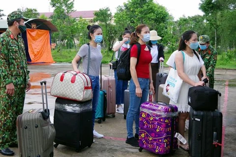 Vietnamitas repatriados desde Singapur completan período de cuarentena
