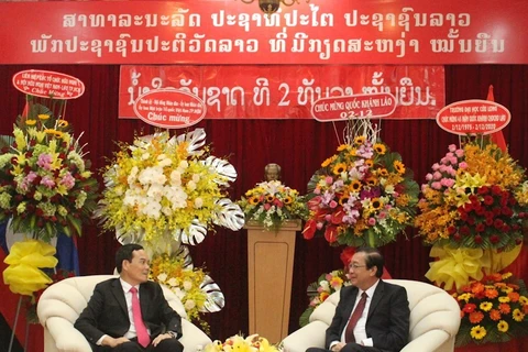 Dirigentes de Ciudad Ho Chi Minh saludan aniversario 45 del Día Nacional de Laos